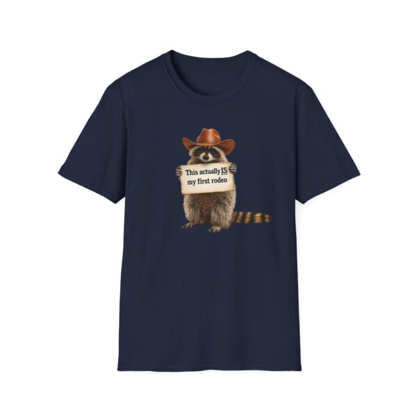 10084133072790186984_2048.jpeg Raccoon Rodeo T‑Shirt — "This actually IS my first rodeo" Cute Western Graphic Tee