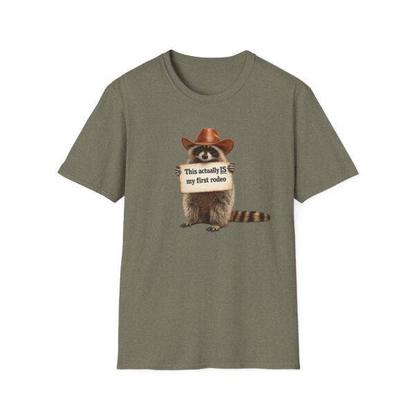 11670742974823296468_2048.jpeg Raccoon Rodeo T‑Shirt — "This actually IS my first rodeo" Cute Western Graphic Tee