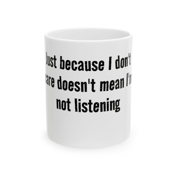 12762876759733580070_2048.jpeg Ceramic Mug — "Just because I don't care doesn't mean I'm not listening" Coffee Cup