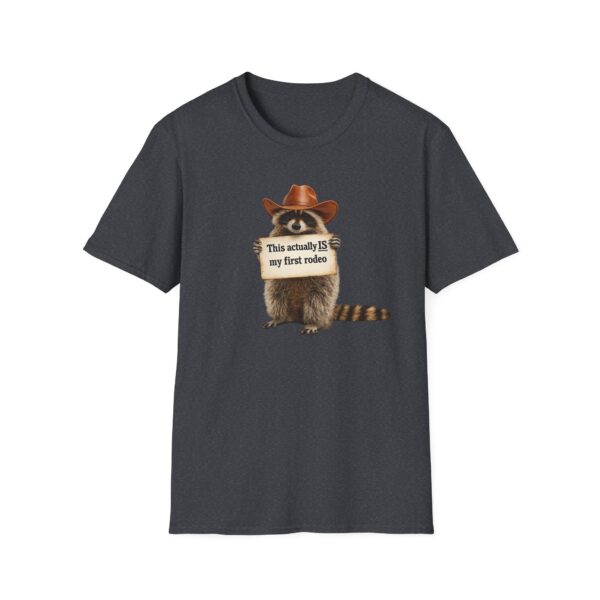 13680140933607813725_2048.jpeg Raccoon Rodeo T‑Shirt — "This actually IS my first rodeo" Cute Western Graphic Tee