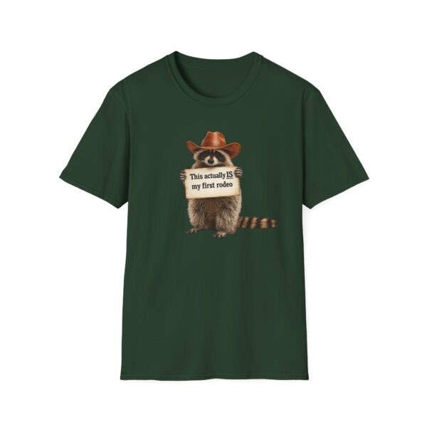 8371114026130840621_2048.jpeg Raccoon Rodeo T‑Shirt — "This actually IS my first rodeo" Cute Western Graphic Tee