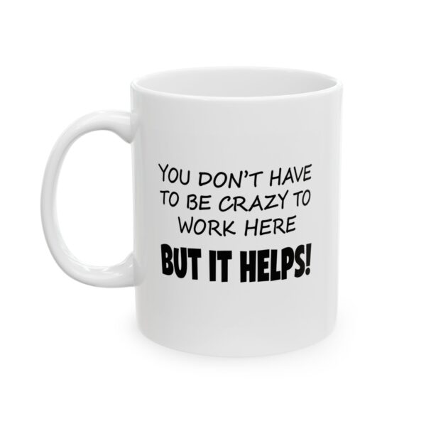 Funny Office Mug — "You Don't Have to Be Crazy to Work Here But It Helps" Ceramic Coffee Cup (11oz, 15oz)